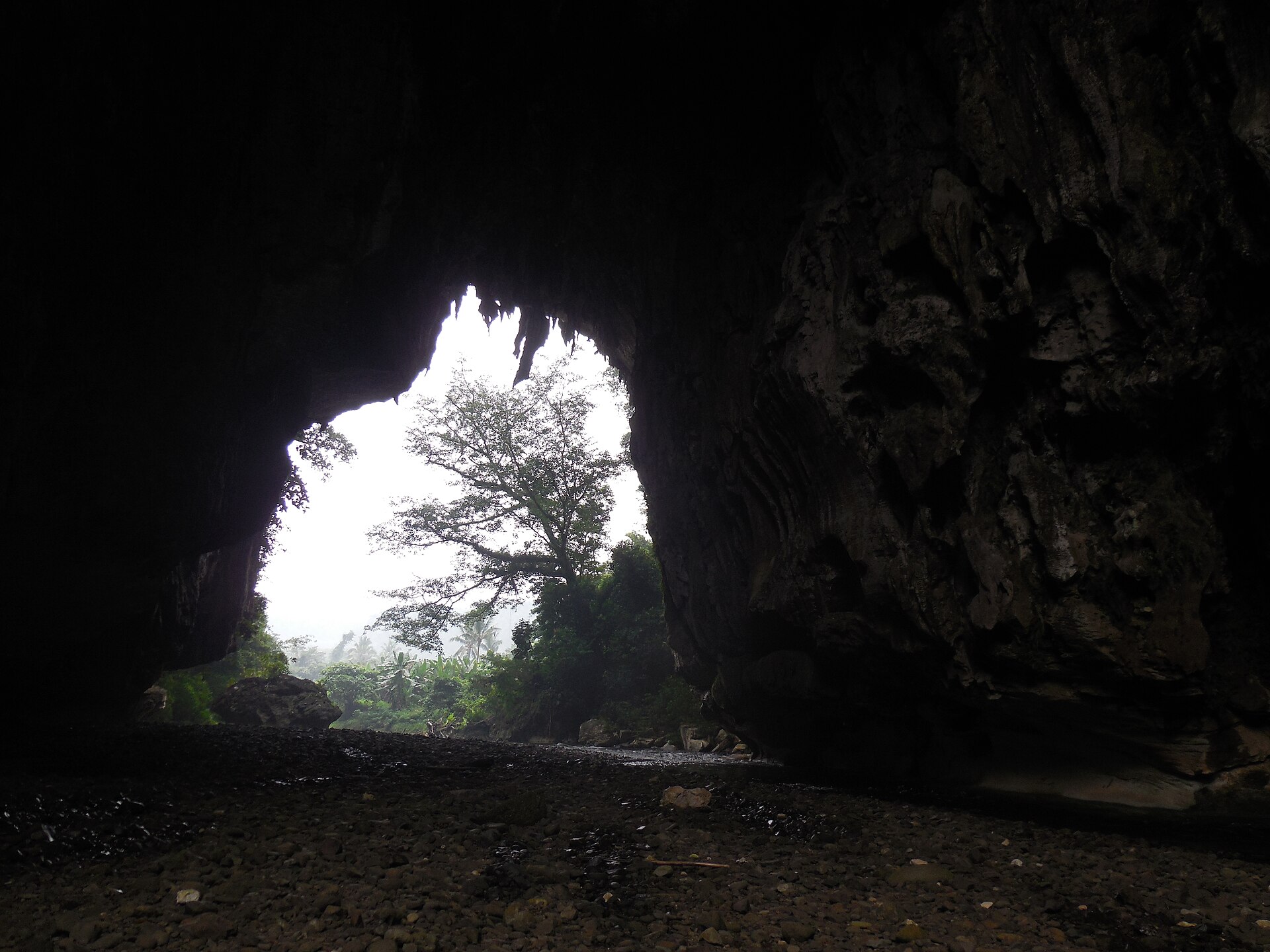 The limestone arch of Sohoton Natural Bridge beside the Cadacan River, Basey, Samar.